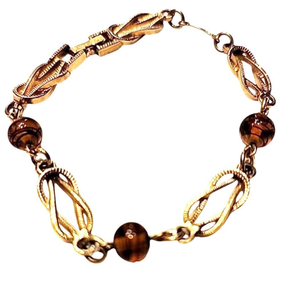 Vintage Avon Bracelet Gold Tone With Love Knot And Amber Color Beads With Swirls